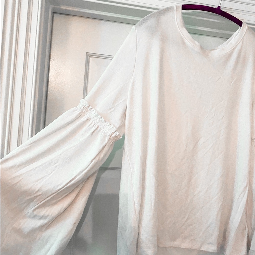 white bell-sleeve long sleeve